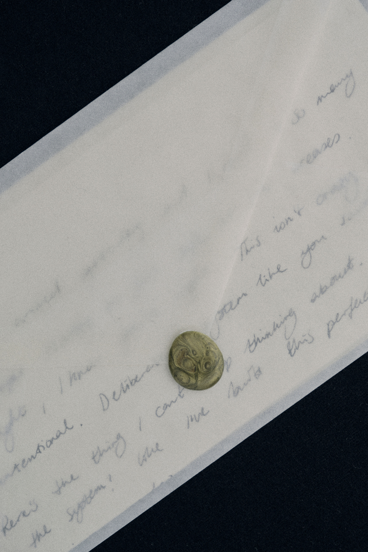 Handwritten letter with a wax coin seal